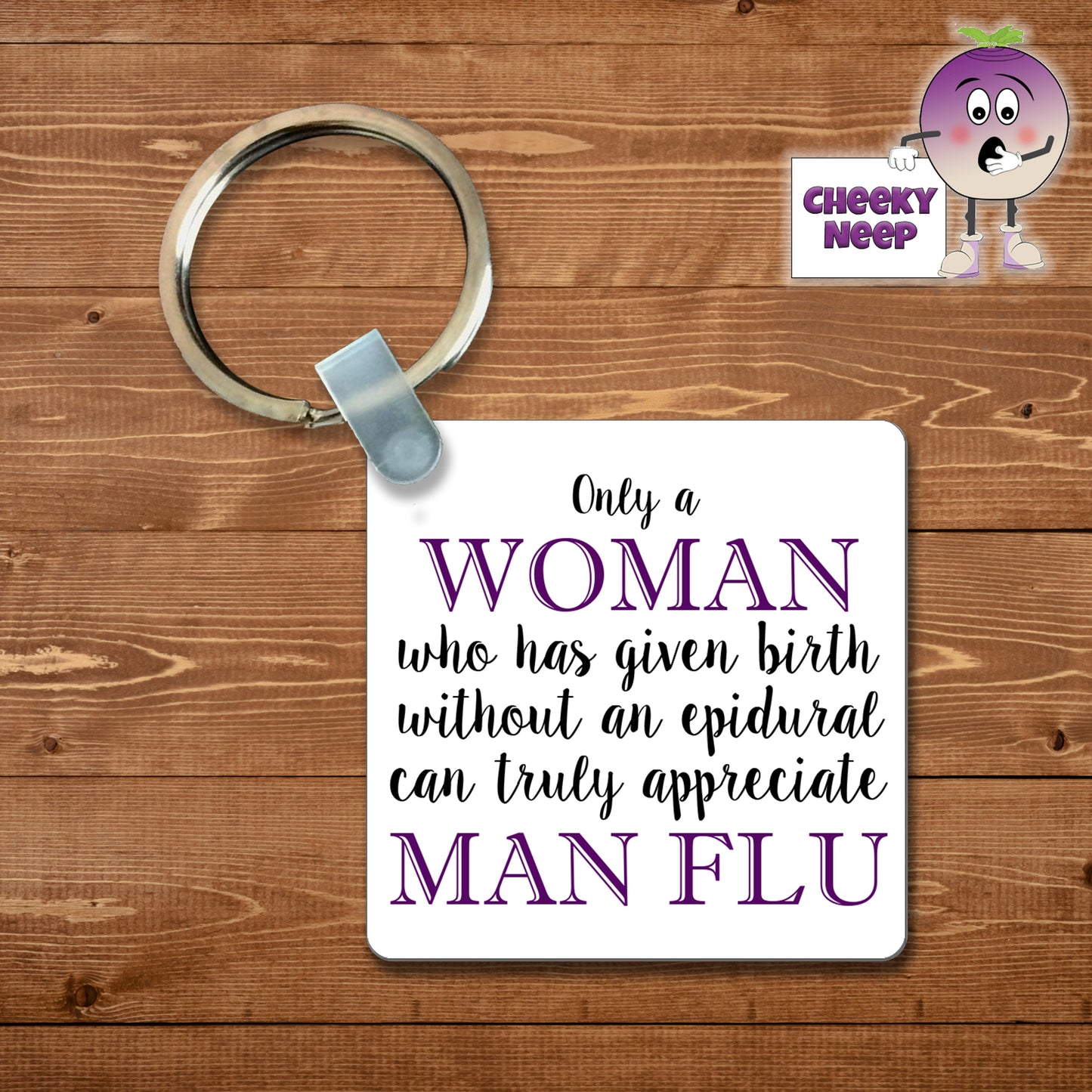 Square plastic keyring with the words "Only a WOMAN who has given birth without an epidural can truly appreciate MAN FLU" printed on both sides.