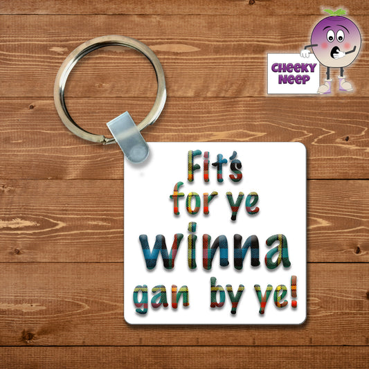 Square plastic keyring with the words "Fit'f For Ye Winna Gan By Ye!" printed on both sides.