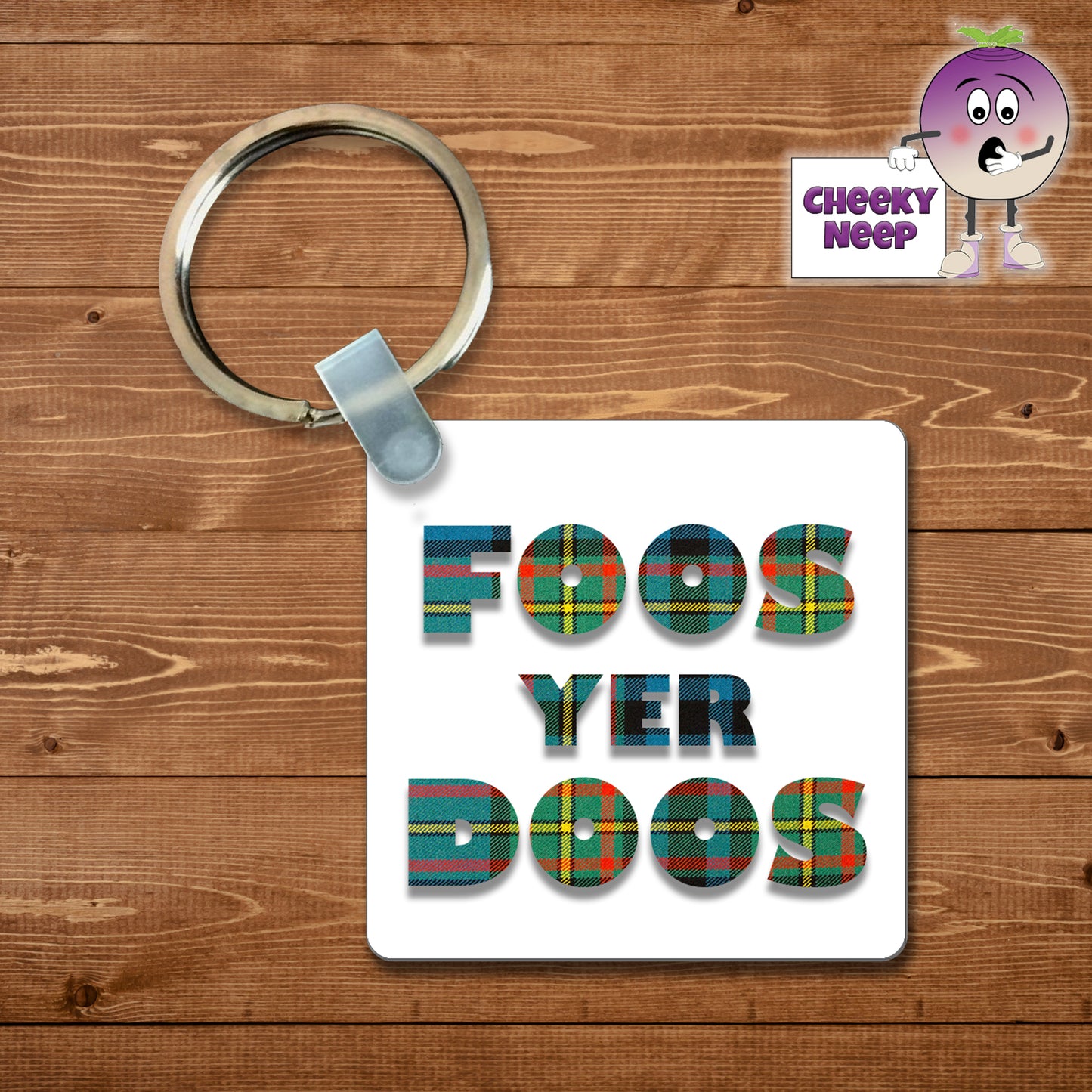 Square plastic keyring with the words "Foos Yer Doos" printed on both sides.