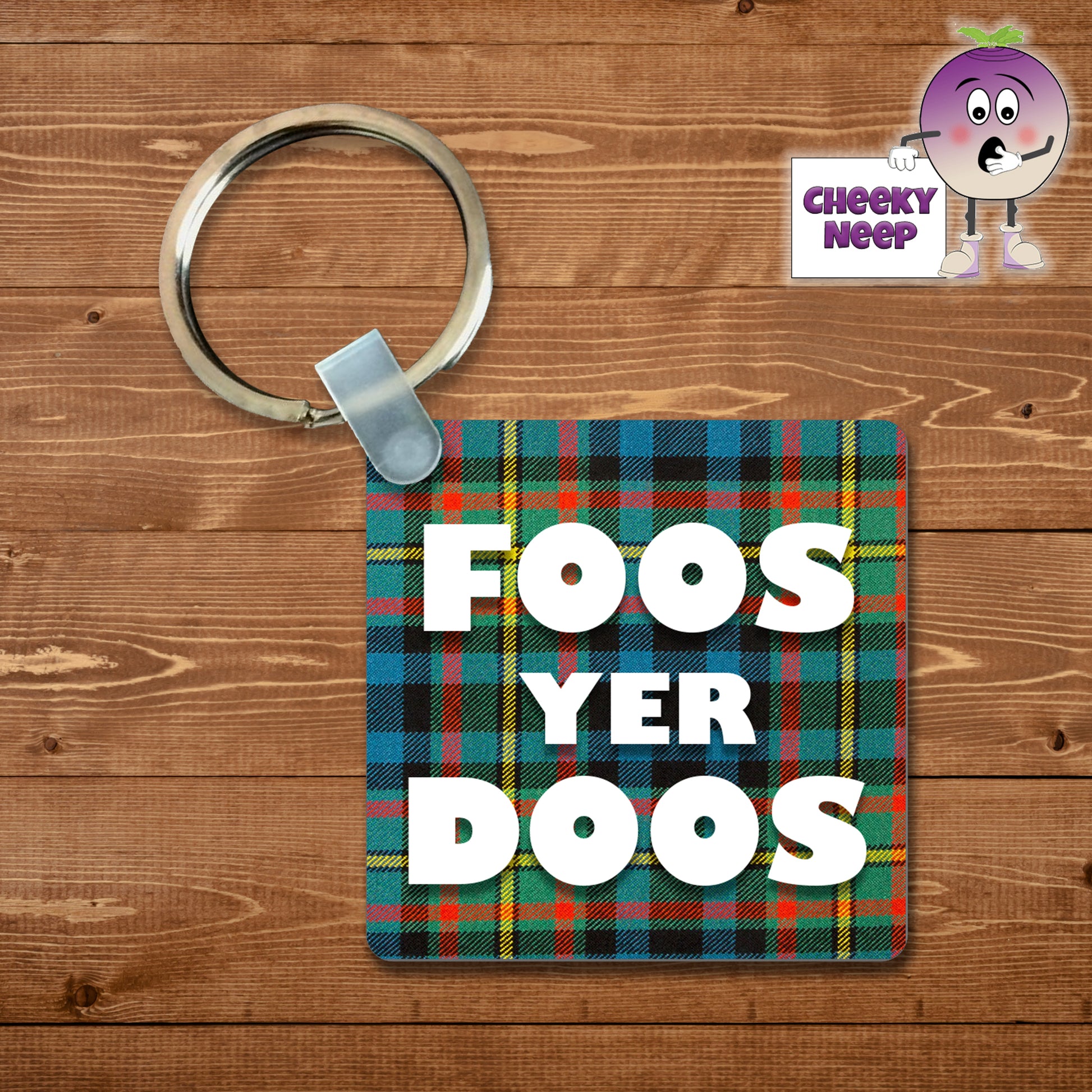 Square plastic keyring with the words "Foos Yer Doos" printed on both sides.