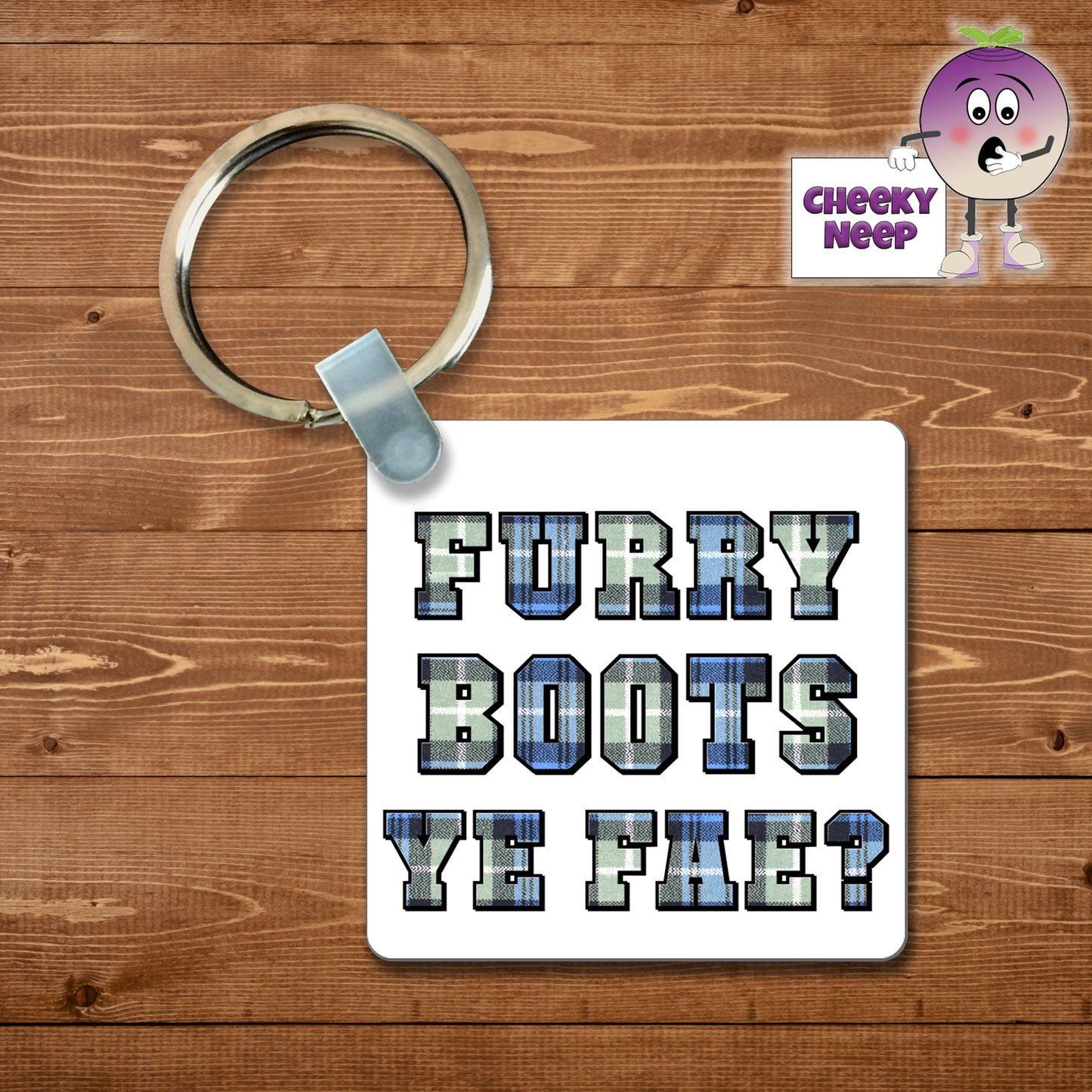 Square plastic keyring with the words "Furry Boots Ye Fae?" printed on both sides.