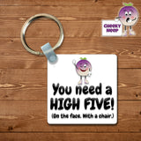 Square plastic keyring with the words "You need a HIGH FIVE! (On the face. With a chair.)" printed on both sides.