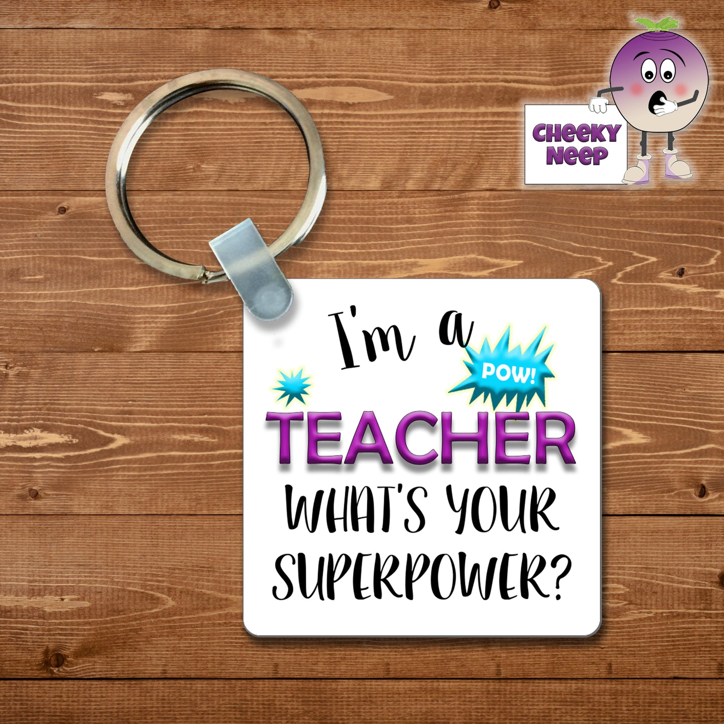 Square plastic keyring with the words "I'm a teacher what's your superpower?" printed on both sides.