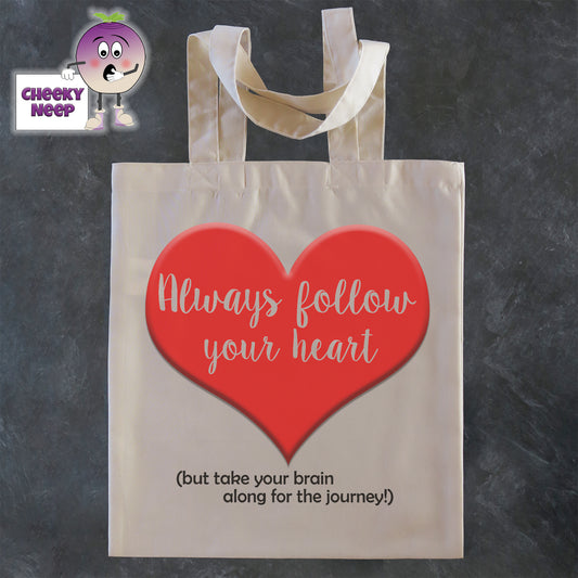 Tote Shopping bag in natural with the words "Always follow your heart (but take your brain along for the journey)" printed on the bag