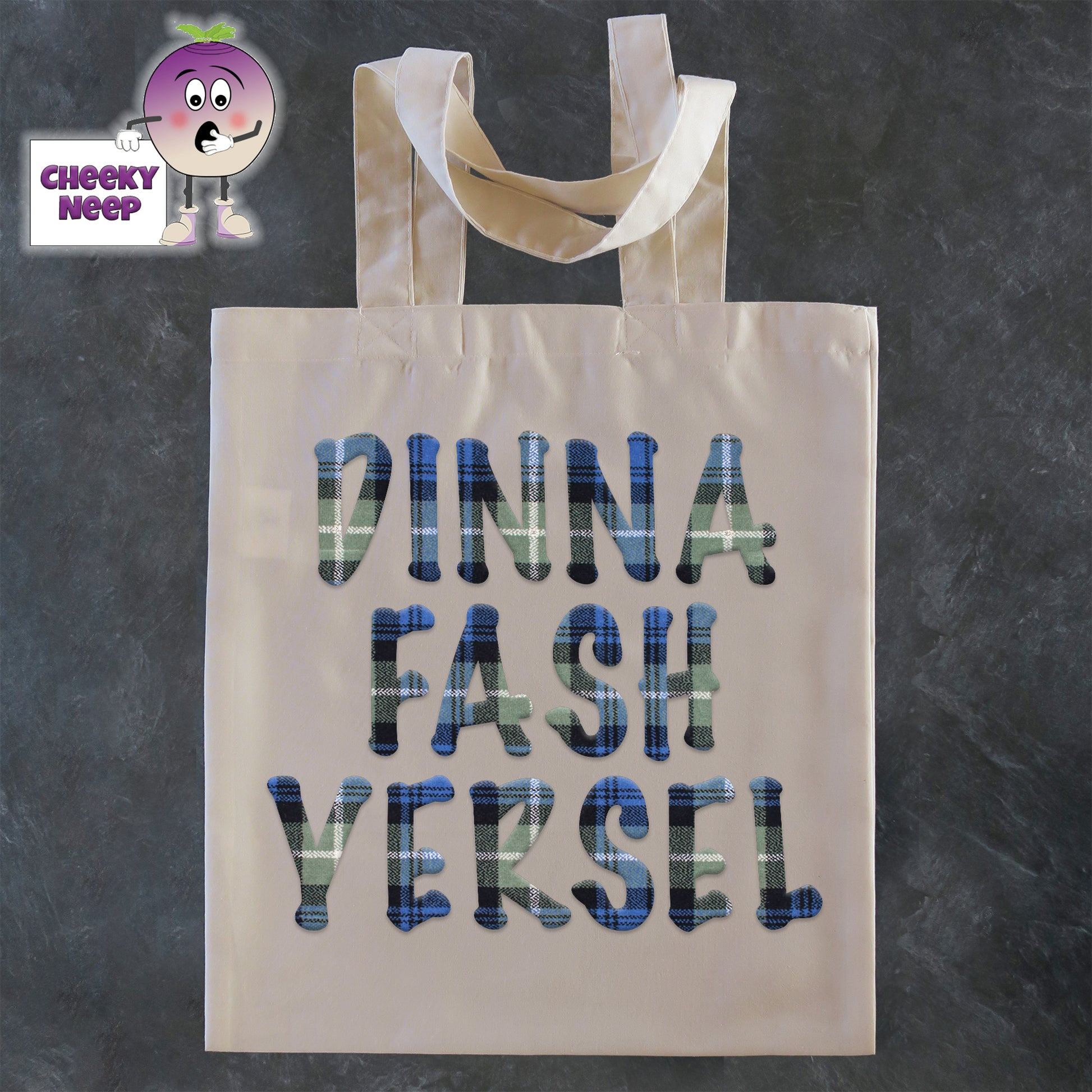 Tote Shopping bag in natural with the words "Dinna Fash Yersel" printed on the bag