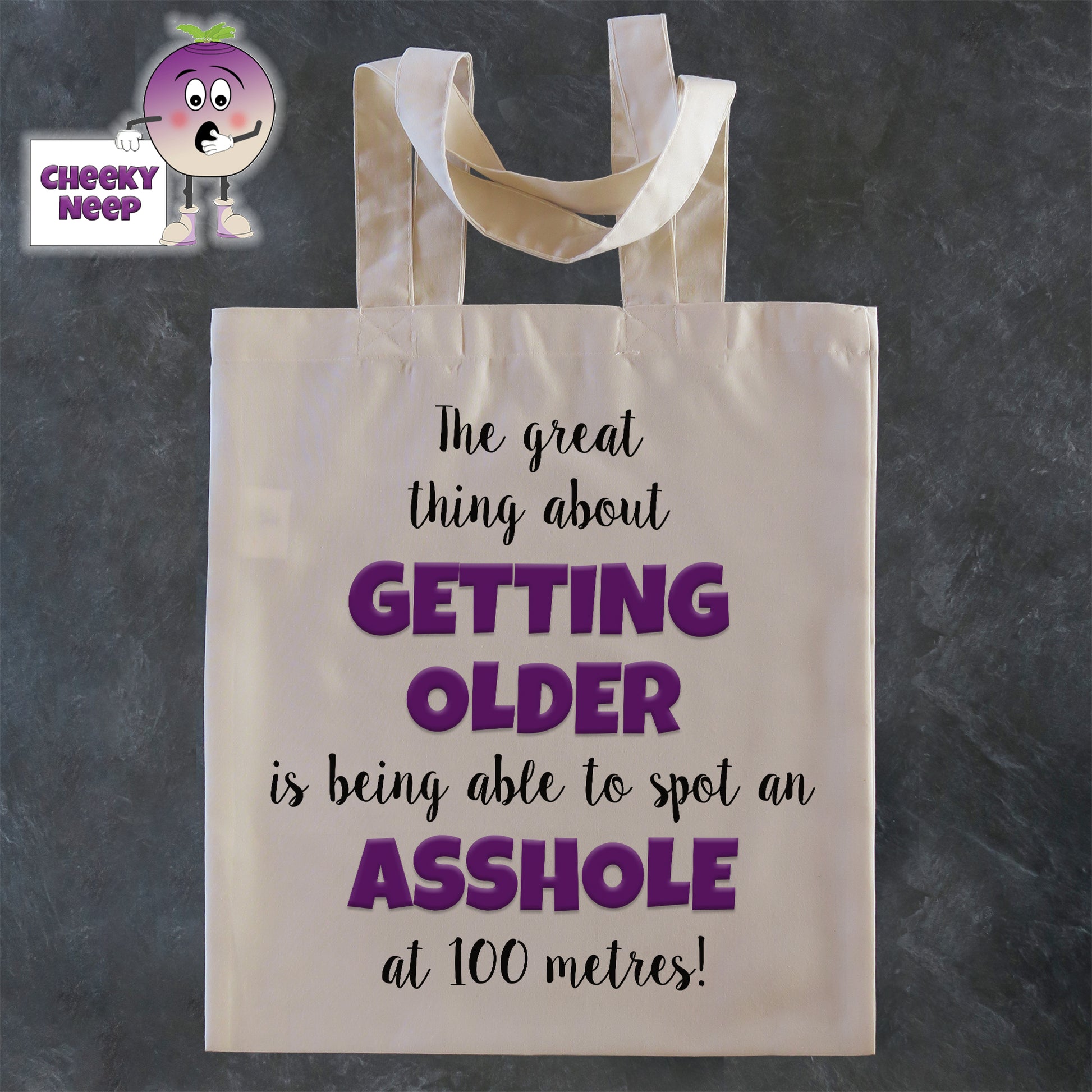 Tote Shopping bag in natural with the words "The great thing about GETTING OLDER Is being able to spot an ASSHOLE at 100 metres!" printed on the bag