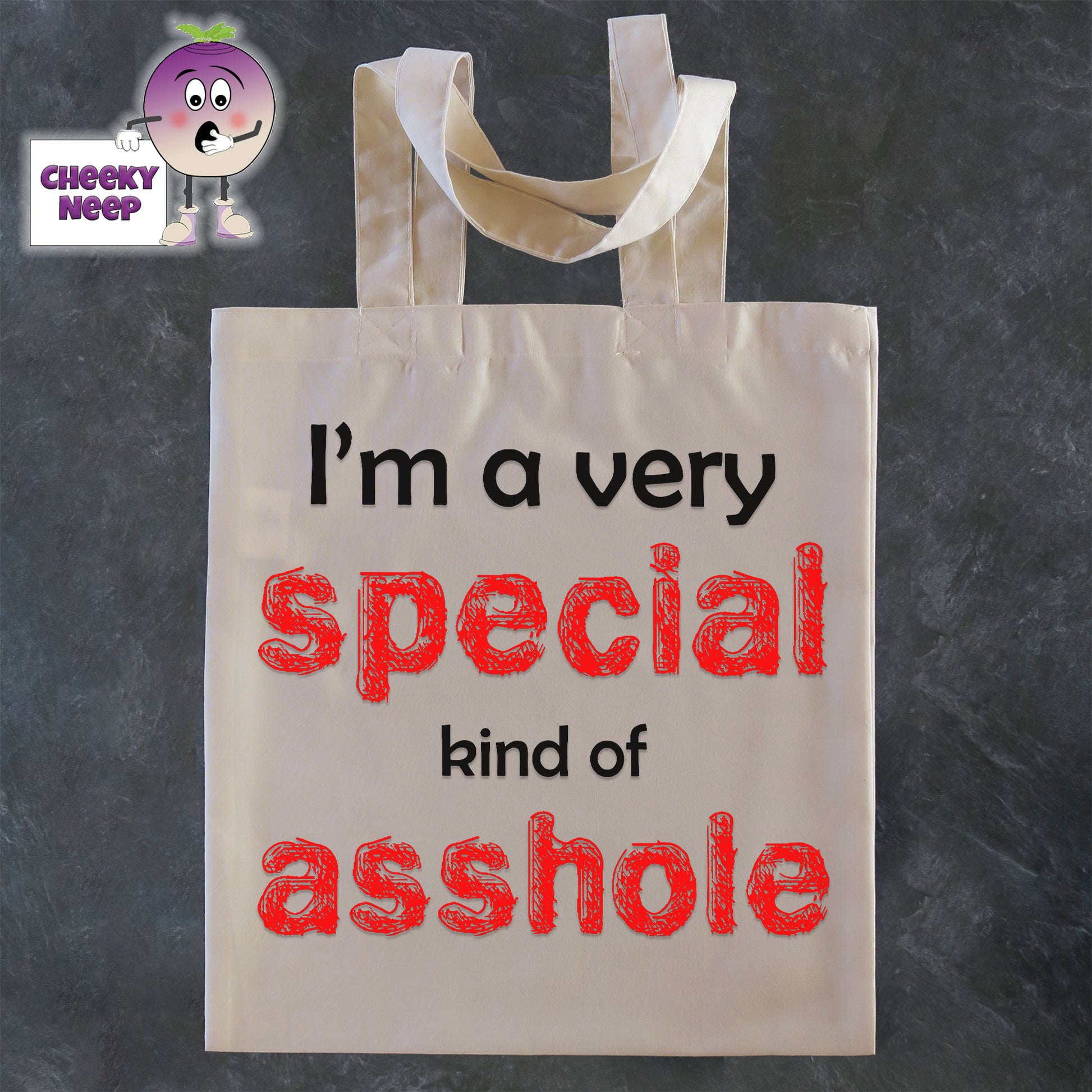 Tote Shopping bag in natural with the words "I'm a very special kind of asshole" printed on the bag