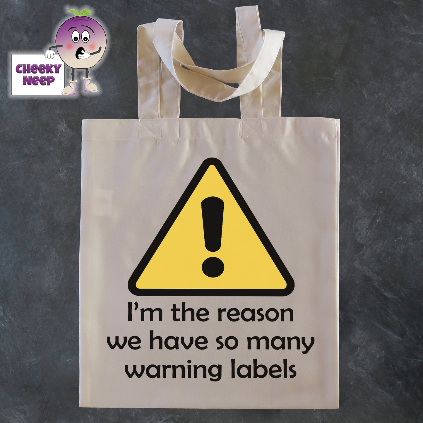 Tote Shopping bag in natural with the words "I'm the reason we have so many warning labels" printed on the bag