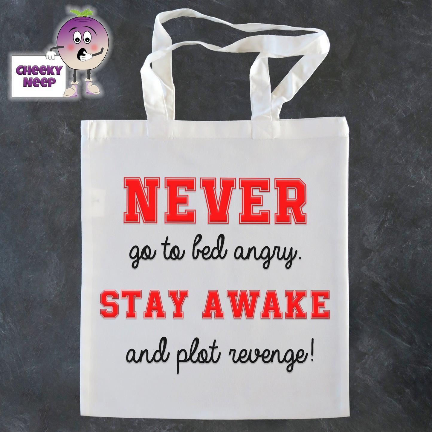 Tote Shopping bag in white with the words "Never go to bed angry Stay awake and plot revenge!" printed on the bag