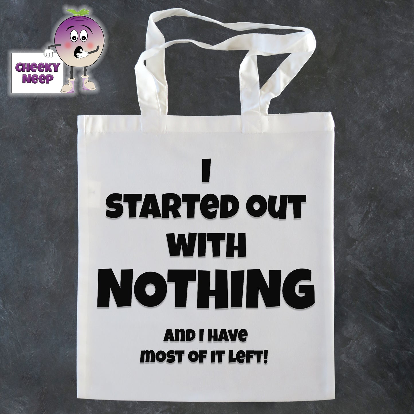 Tote Shopping bag in white with the words "I started out with NOTHING and I have most of it left" printed on the bag