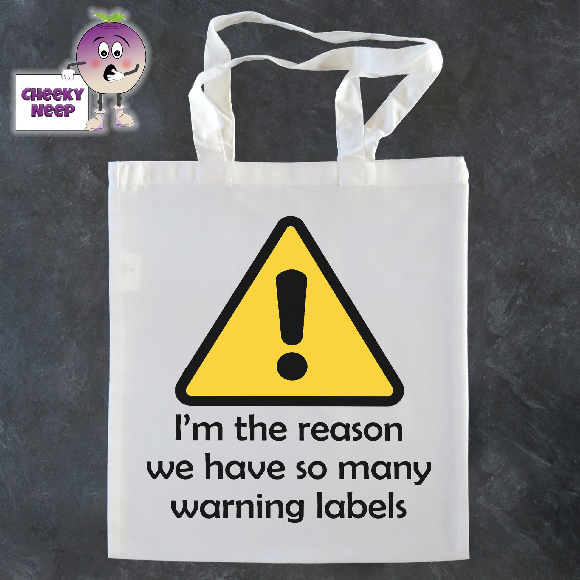 Tote Shopping bag in white with the words "I'm the reason we have so many warning labels" printed on the bag